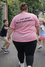 Person walking confidently away outdoors wearing the not sure don't overtake shirt making a perfect thoughtful gift.