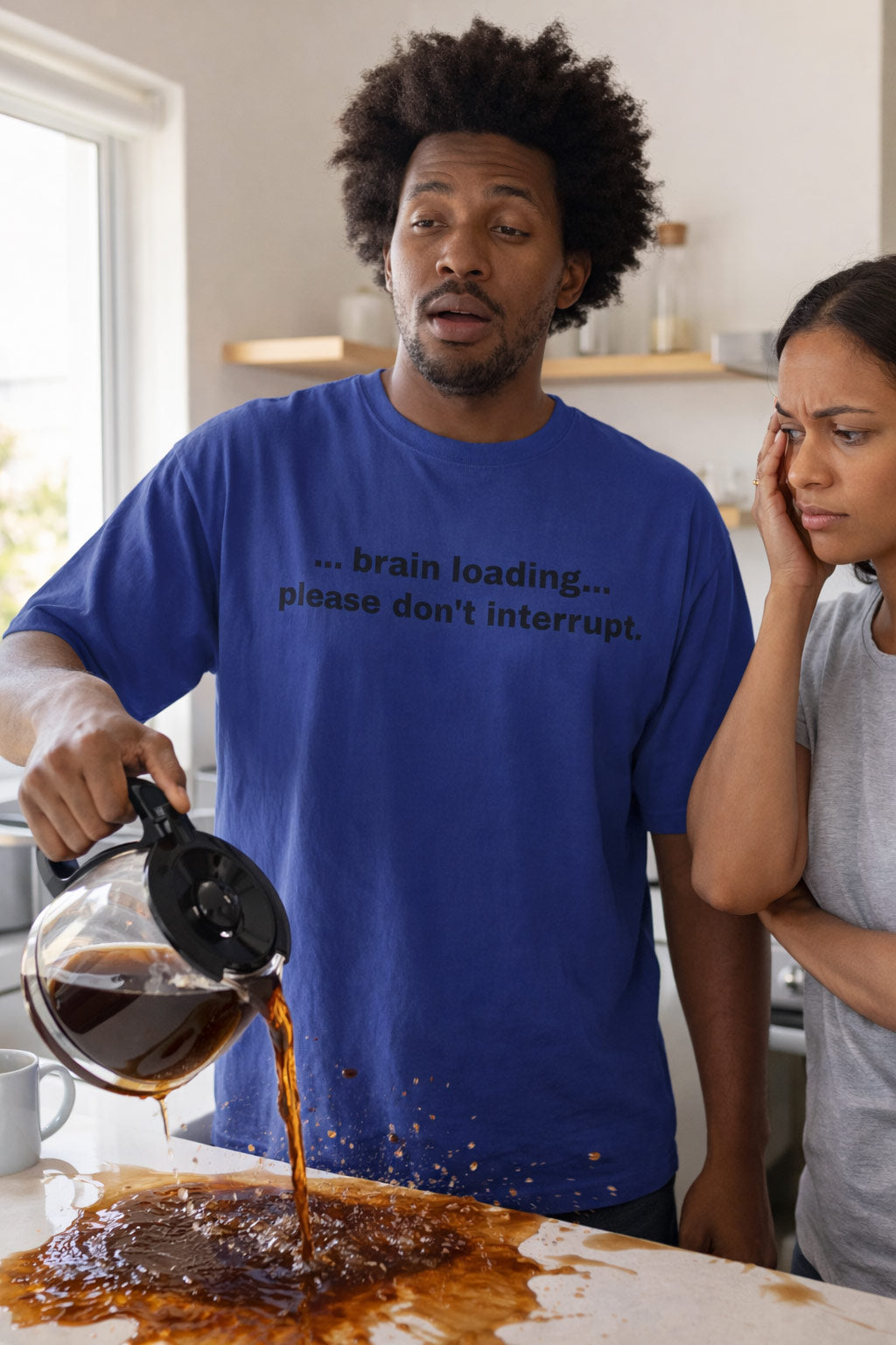 Tired man spilling morning coffee wearing brain loading please don't interrupt perfect for a funny gift.