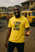 Smiling man open hand wear i too get vibe shirt because good energy dey light up everywhere.