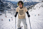Winter action style: THE VIEW CHANGES WHEN YOU DARE. premium shirt worn by a skier; creative gift for a winter sports enthusiast or a friend who loves the outdoors