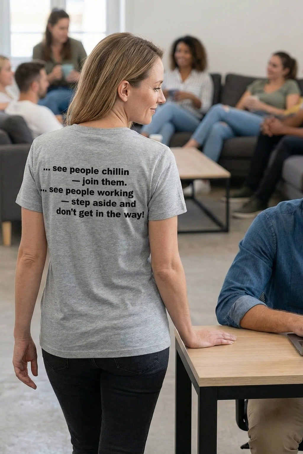 Confident woman leaning on a desk wearing don't get in the way appreciating individual flow, perfect gift.
