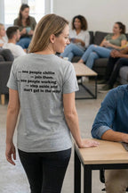 Confident woman leaning on a desk wearing don't get in the way appreciating individual flow, perfect gift.