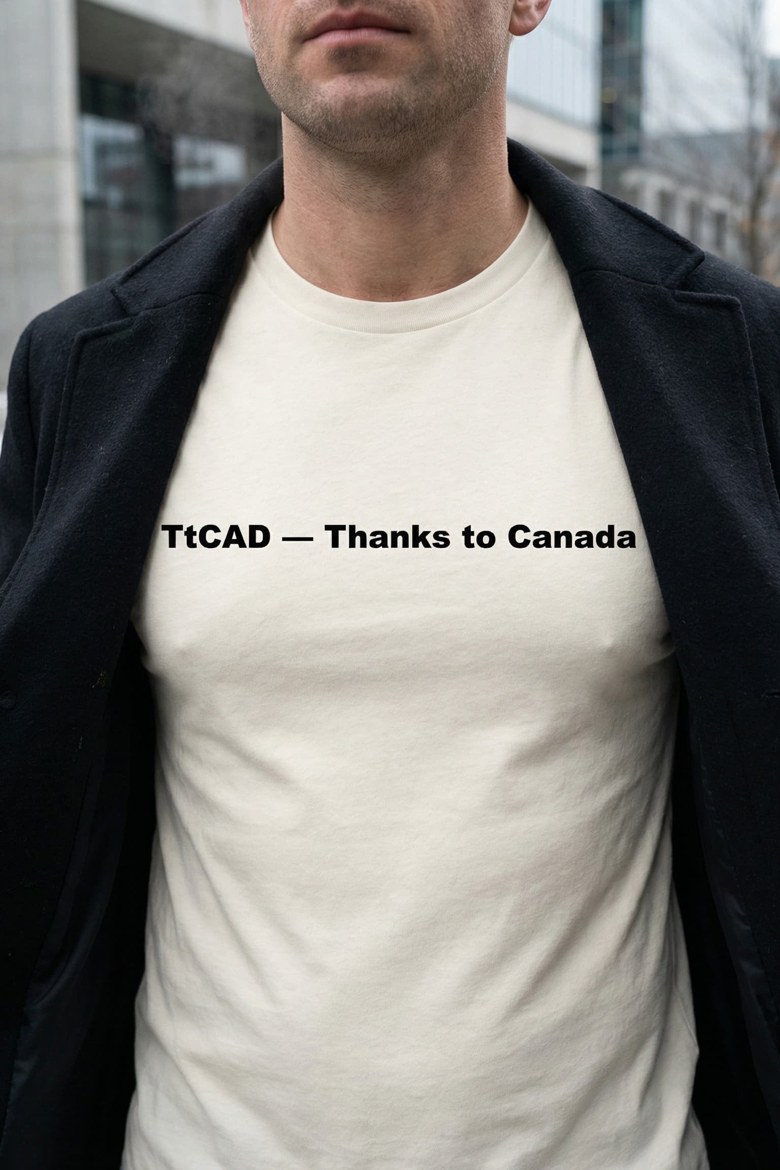 Smiling man in a winter coat wearing thanks to Canada showing deep appreciation, ideal gift for explorers.
