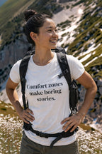 Confident hiker wearing comfort zones make boring stories stepping into the unknown, perfect gift for explorers.