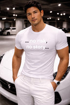 Relaxed person wearing no risk no story near a sports car proving that beautiful moments require action.