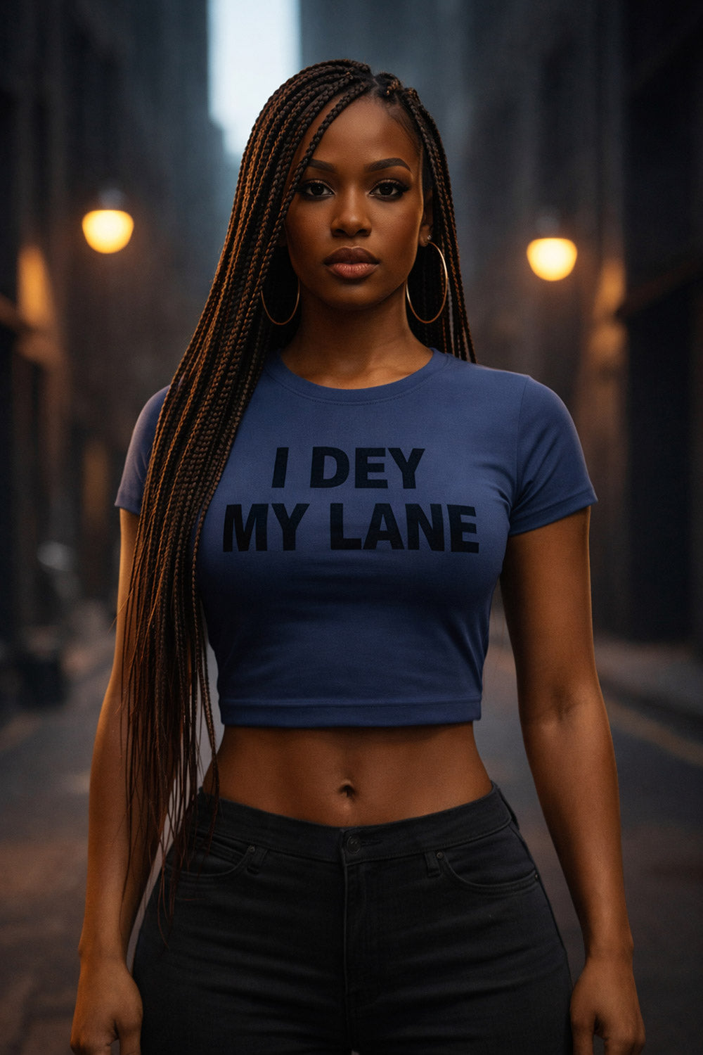 Confident woman stand outside wear i dey my lane shirt because quiet focus dey bring success.