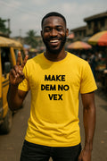 Happy man show peace sign wear make dem no vex shirt as champion no need to apologize.