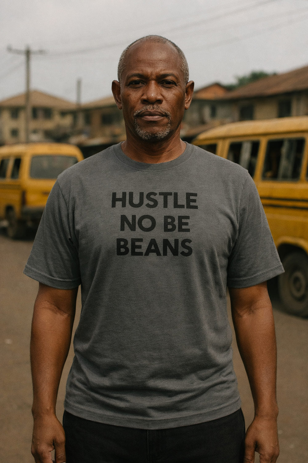 Older man stand outside wear hustle no be beans top as thoughtful gift to celebrate small win.