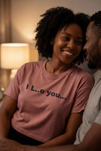 Happy woman sharing an intimate moment in the I L..e you tee ideal for a playful gift.