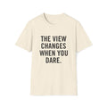 Minimalist flat lay of THE VIEW CHANGES WHEN YOU DARE. premium cream shirt; high-quality fabric detail for a luxury motivational gift