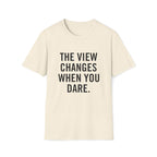 Minimalist flat lay of THE VIEW CHANGES WHEN YOU DARE. premium cream shirt; high-quality fabric detail for a luxury motivational gift