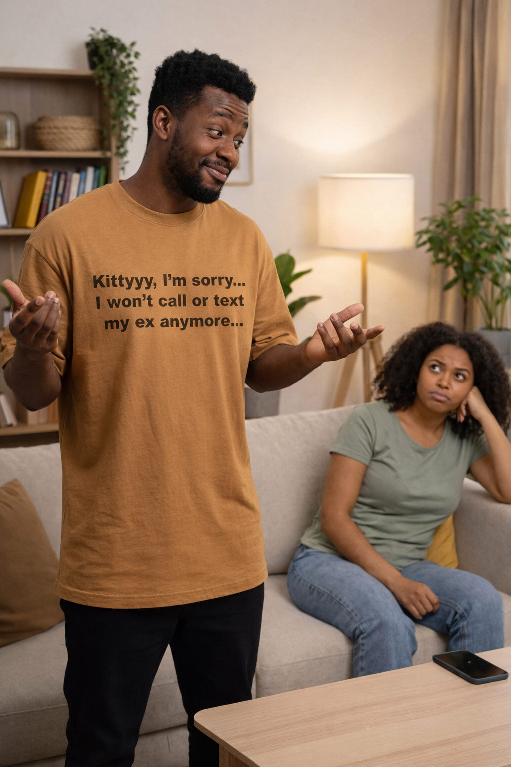 Defensive man explaining himself in Kittyyy I'm sorry I won't call or text my ex for partners.
