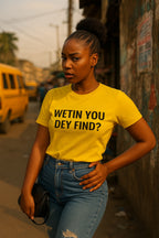 Fine woman stand for street wear wetin you dey find shirt to show her focused personal journey.