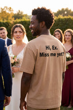 Relaxed man standing outdoors at a wedding in hi ex miss me yet shirt for bold individuals.