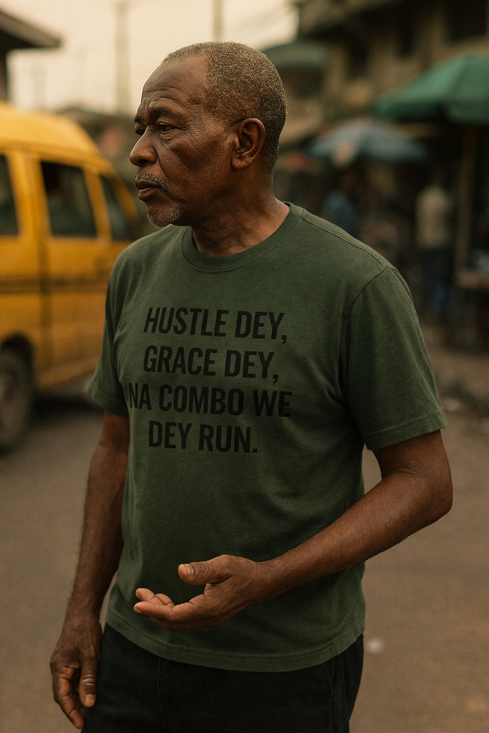 Serious older man look side wear hustle dey grace dey na combo we dey run tee gently.