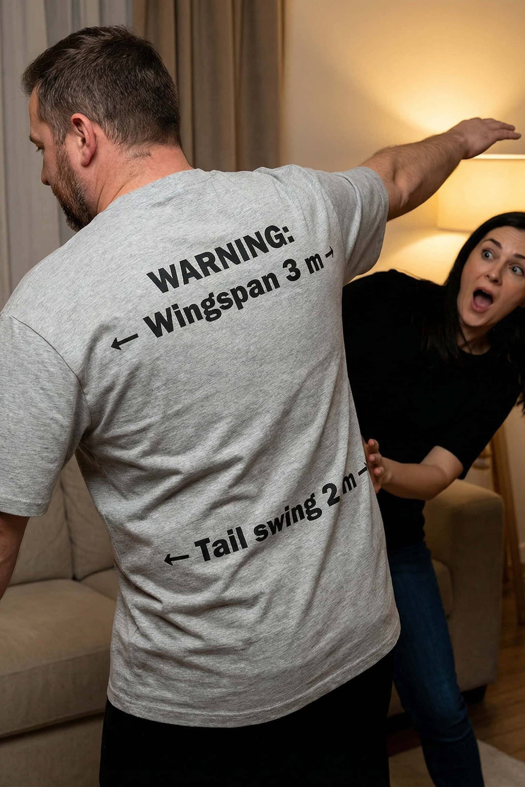 Clumsy man dancing wearing warning wingspan 3 m tail swing 2 m causing unpredictable adventures, perfect gift.