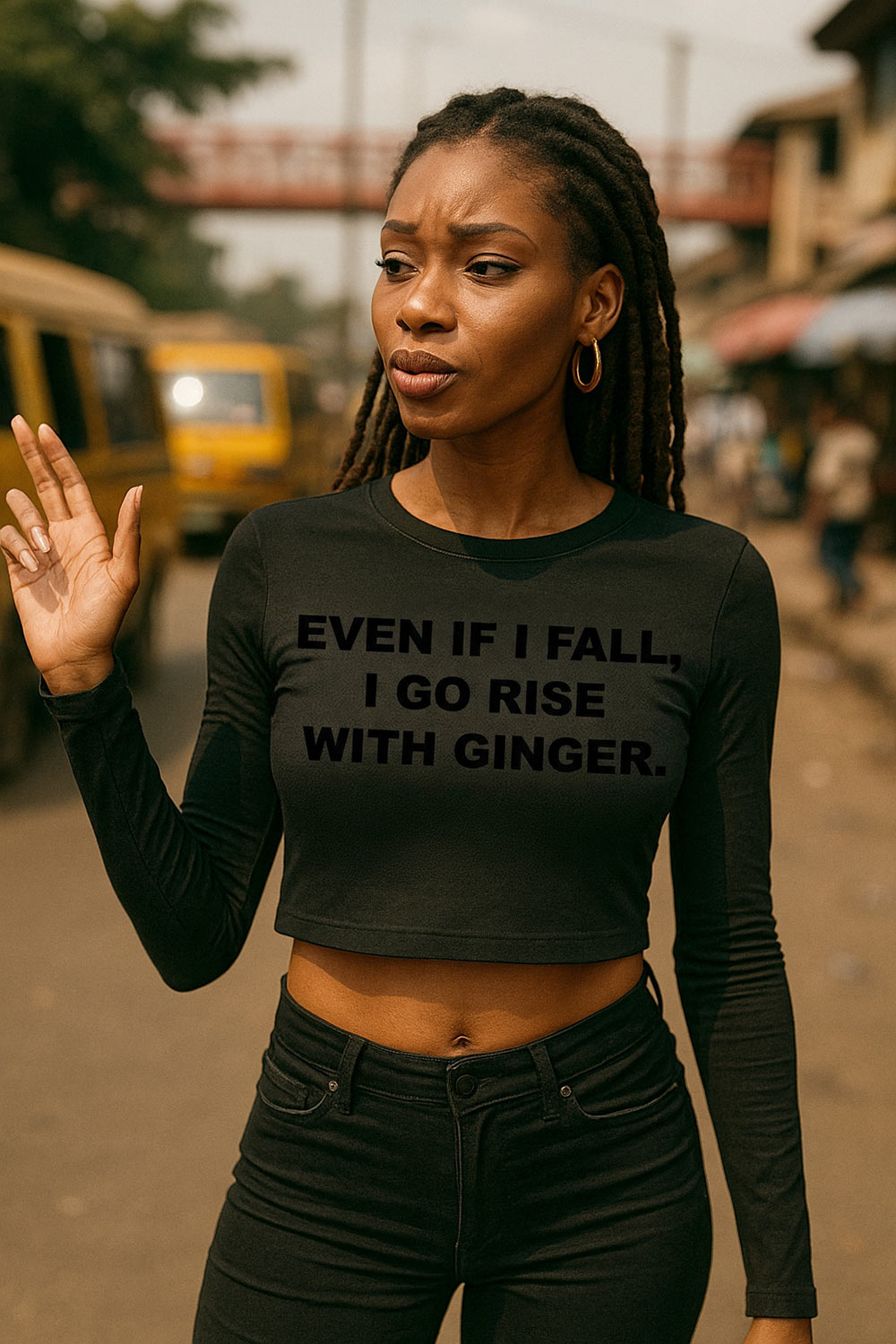 Serious woman raise hand wear even if i fall i go rise with ginger crop top today.