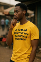 Thoughtful guy touch chin wear if dem no believe in you use success shock dem tee gently.
