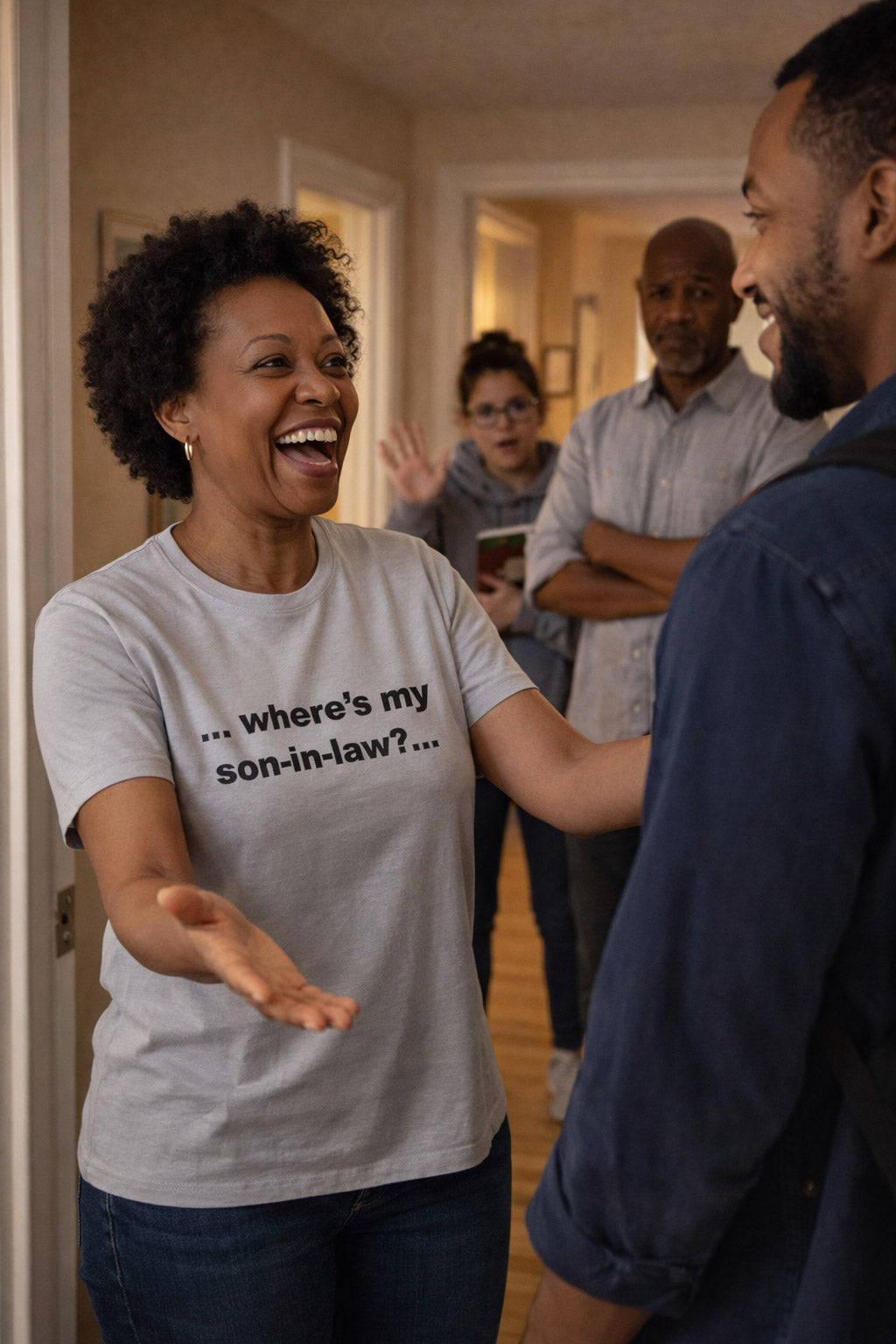 Cheerful woman greeting guests wearing the where's my son-in-law tee making a perfect parent gift.
