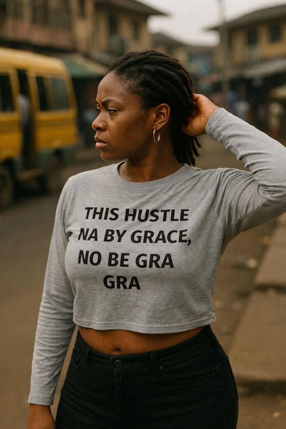 Woman looking back wearing this hustle na by grace no be gra gra knowing heaven bless her sweat.