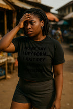 Tired woman holding head in no be say I dey form I just dey avoid nonsense keeping peace.