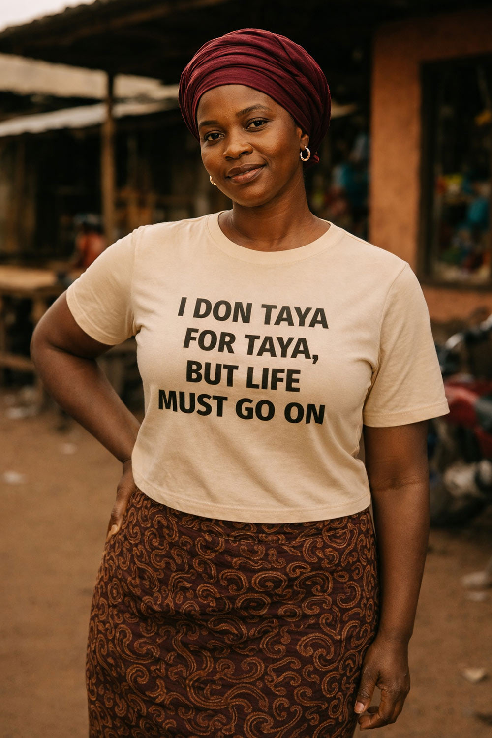 Confident woman standing wearing I don taya for taya but life must go on strong determination gift.