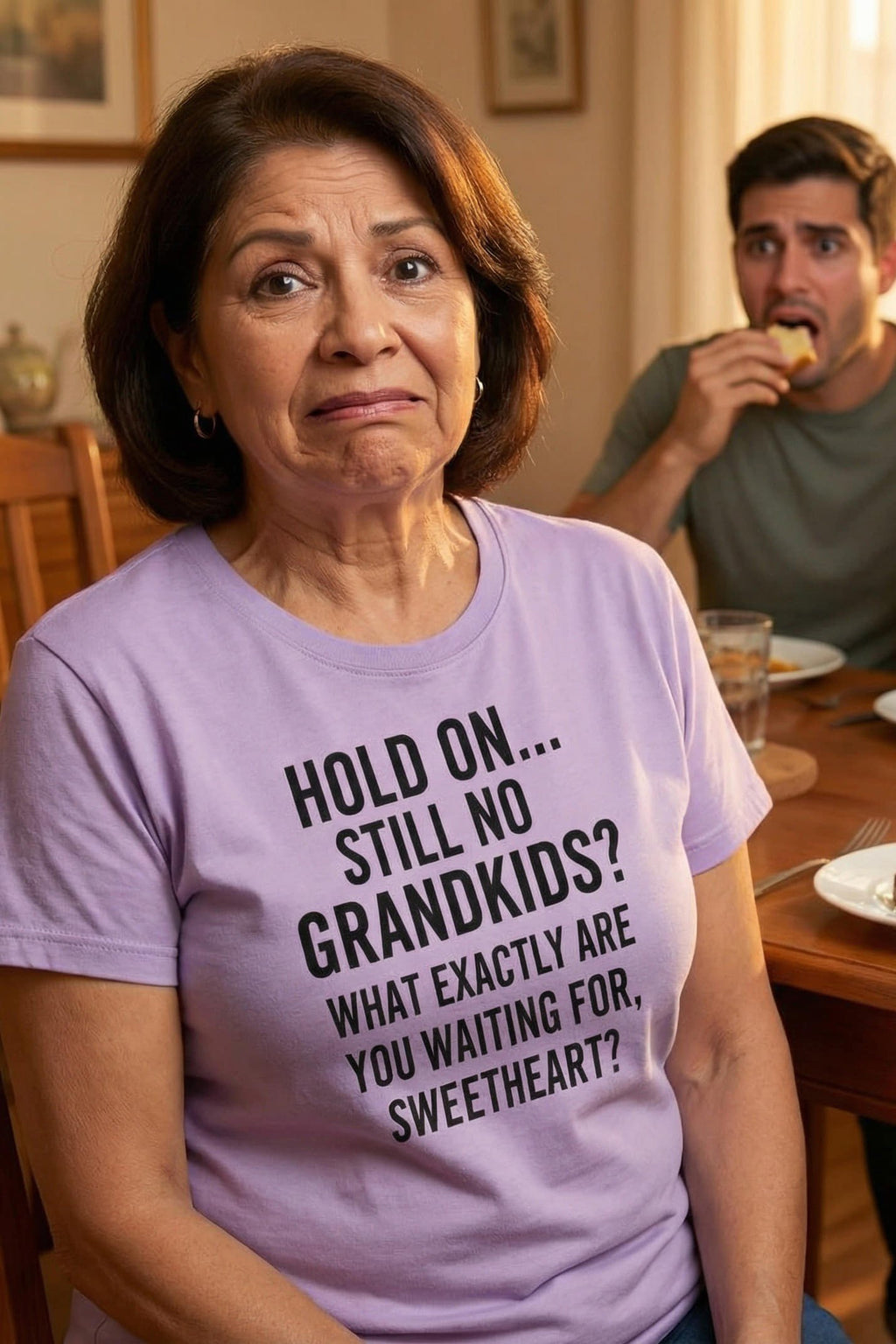 Impatient woman at dinner wearing hold on still no grandkids sharing a gentle teasing nudge, perfect gift.