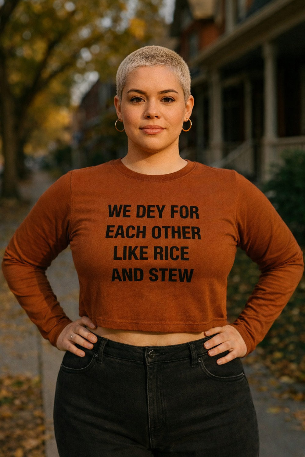 Confident woman standing in we dey for each other like rice and stew perfect connection meaningful gift.