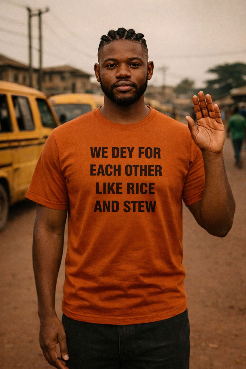 Relaxed man waving wearing we dey for each other like rice and stew pure blessing perfect gift.