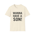 Minimalist flat lay of WANNA HAVE A SON! premium cream shirt; high-quality fabric detail for a luxury gift for couples and families