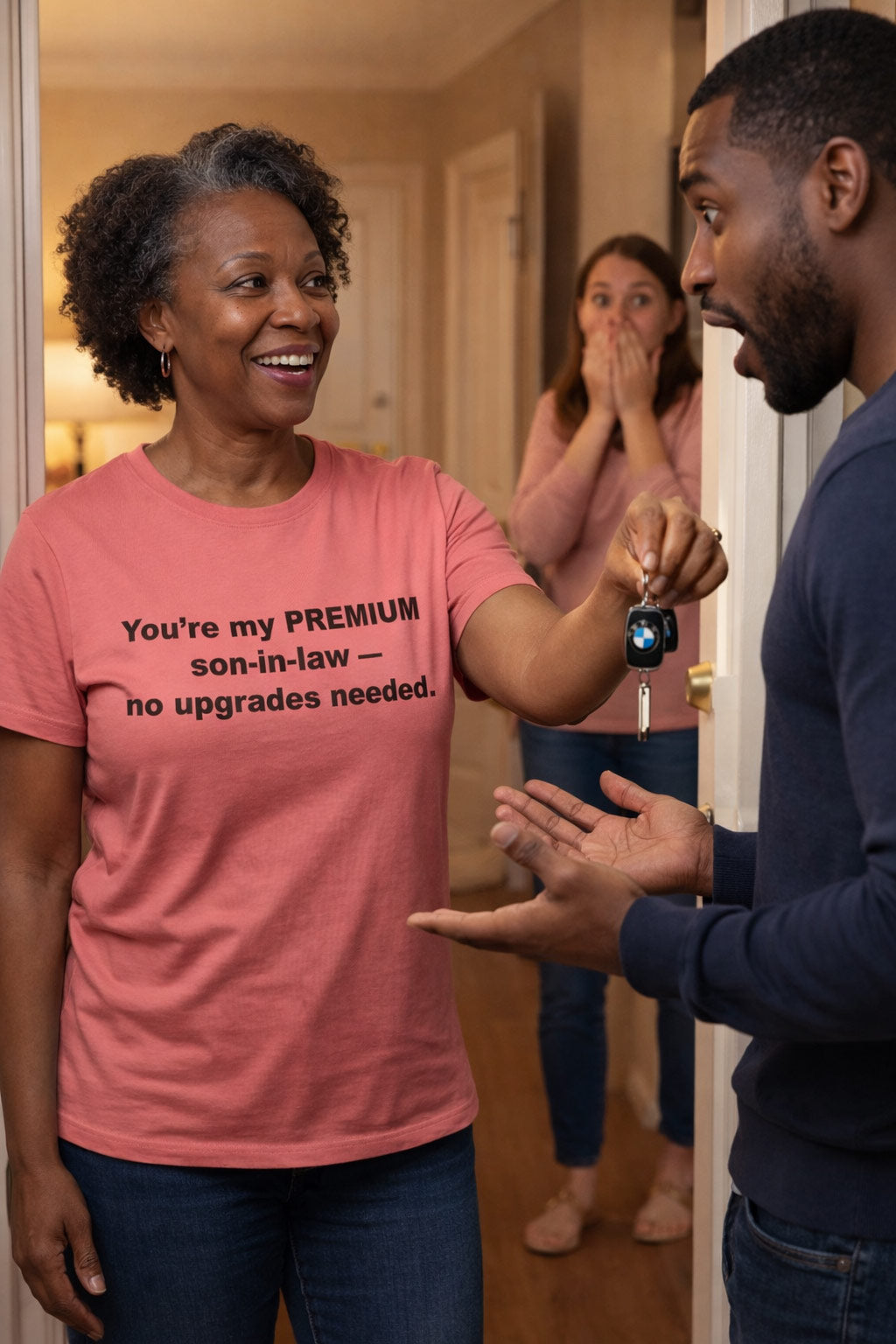 Cheerful woman handing over keys in you're my premium son-in-law no upgrades needed shirt validating relationships.