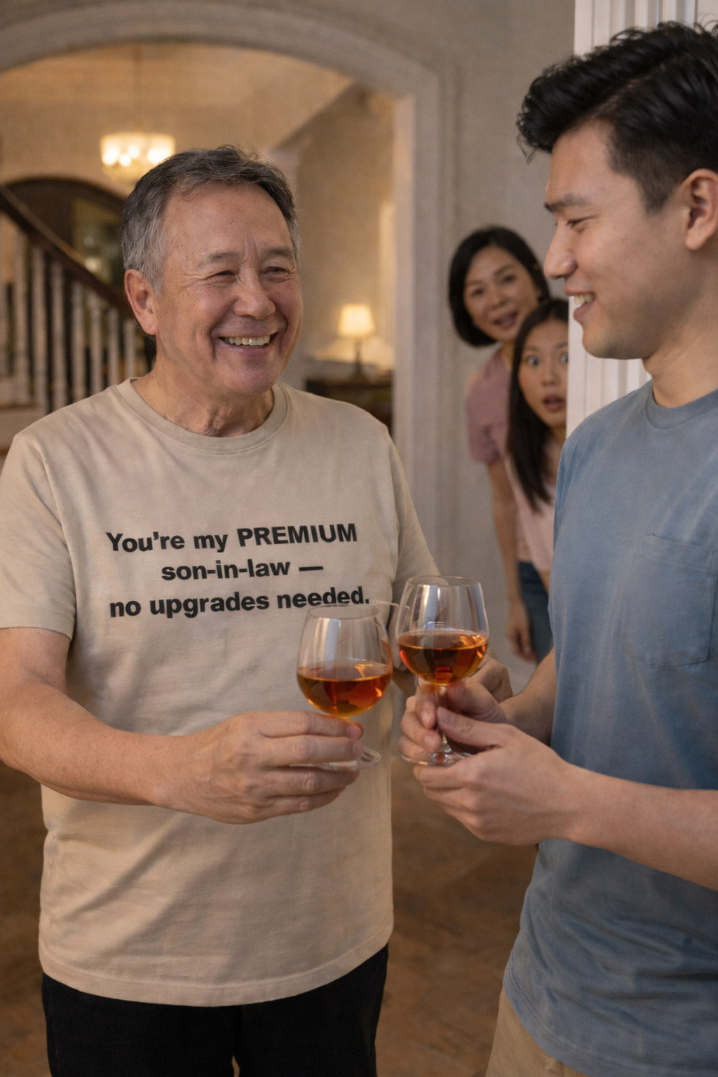 Smiling man toasting wine wearing you're my premium son-in-law no upgrades needed tee a perfect gift.