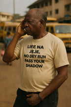 Older man looking away in life na jeje no dey run pass your shadow true progress gift.