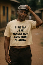 Calm older man touching cap in life na jeje no dey run pass your shadow perfect gift.
