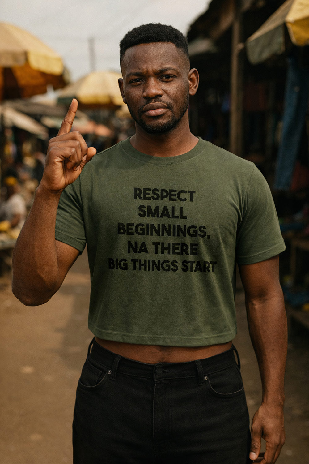 Serious man pointing up wearing respect small beginnings na there big things start strong foundation gift.