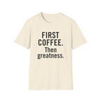 Minimalist flat lay of FIRST COFFEE. Then greatness. premium cream shirt; high-quality fabric detail for a luxury gift for coffee lovers