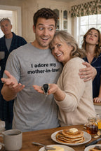 Happy man at breakfast wearing the I adore my mother-in-law shirt expressing genuine affection for family.