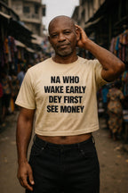 Confident older man touching head in na who wake early dey first see money daily dedication gift.
