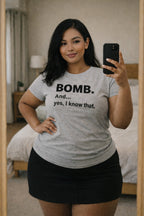 Authentic self-love: woman in BOMB. And yes, I know that. tee taking a mirror selfie; great gift for a bestie or a treat for yourself