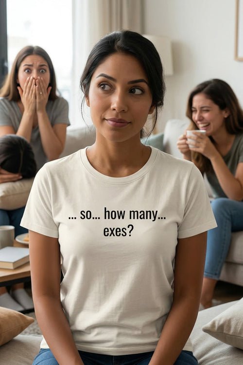 Thoughtful woman sitting with friends wearing so how many exes embracing playful awkwardness, an ideal friend gift.