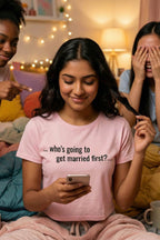 Smiling woman texting on bed wearing who's going to get married first navigating romance, ideal friend gift.