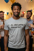 Smiling man at a party wearing so who's getting divorced first embracing unfiltered honesty, perfect gift.
