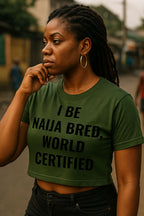 Thoughtful woman looking away wearing I be naija bred world certified proving pure talent meaningful gift.