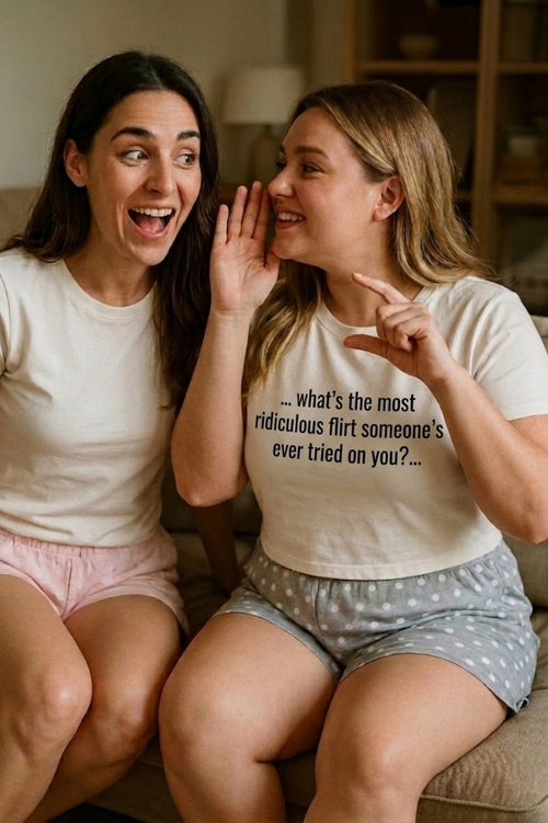 Women whispering on couch wearing what's the most ridiculous flirt someone's ever tried on you, perfect gift.