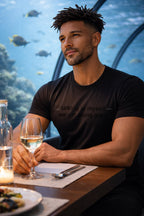 Casual lifestyle shot of man wearing talking to myself we get along great dining alone in peaceful solitude.