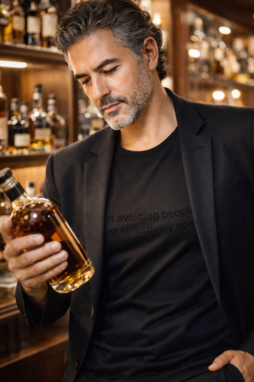 Sophisticated man wearing not avoiding people just selectively social while finding fulfillment in a quiet drink for introverts.
