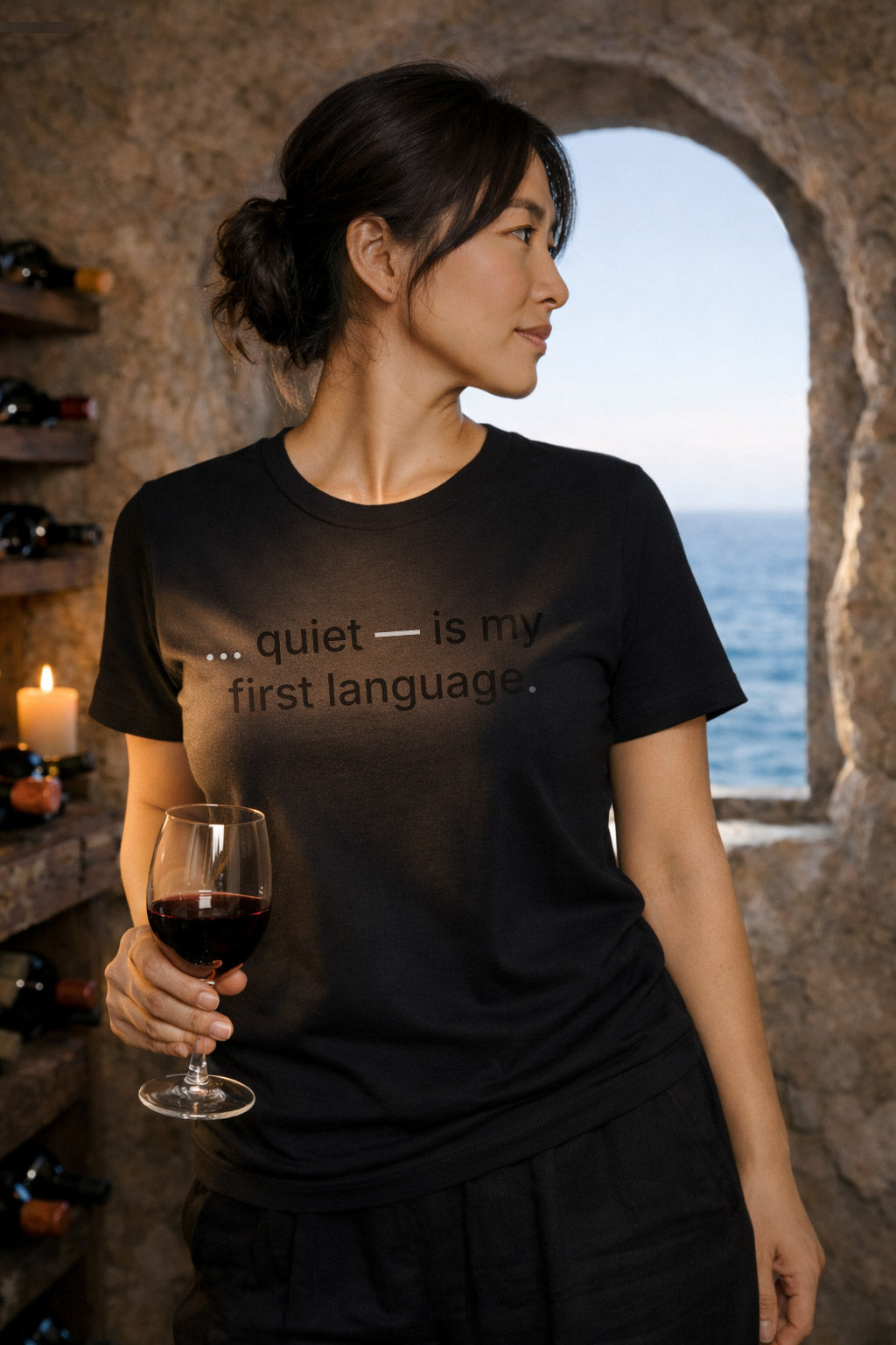 Relaxed woman wearing quiet is my first language finding profound depth in moments when words are left unsaid.