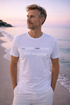 Handsome man wearing quiet is my first language realizing that confidence doesn't need a loud voice to impact.