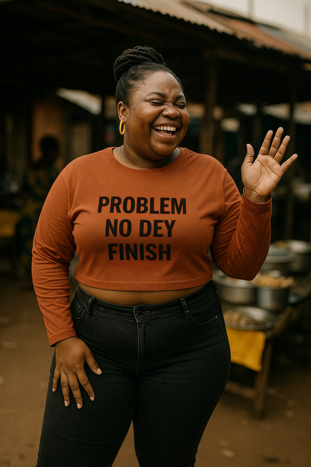 Smiling woman wave hand wear problem no dey finish shirt as thoughtful gift to enjoy little moments.