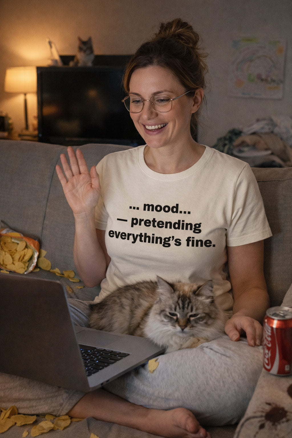 Woman on a video call ignoring messes wearing mood pretending everything's fine tee a relatable gift.